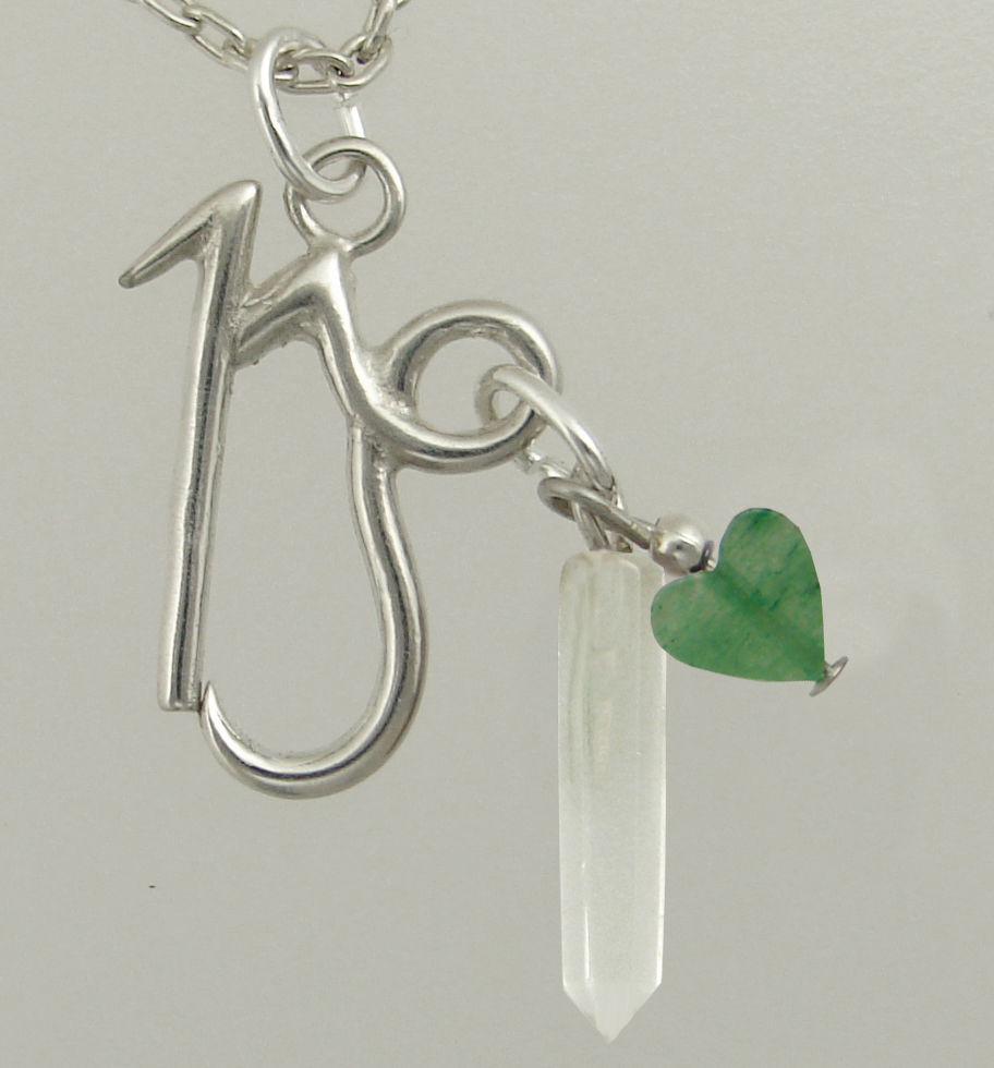 Sterling Silver Capricorn Pendant Necklace With an Clear Crystal And Green Heart
